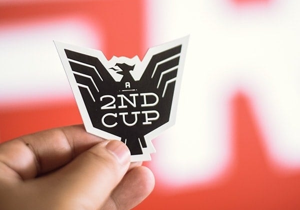 Hand holding A 2nd Cup sticker